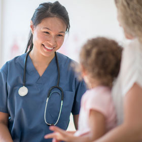 Health Clinic - Doctor with Child and Mother