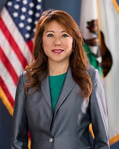 Portrait of California State Treasurer Fiona Ma wearing gray