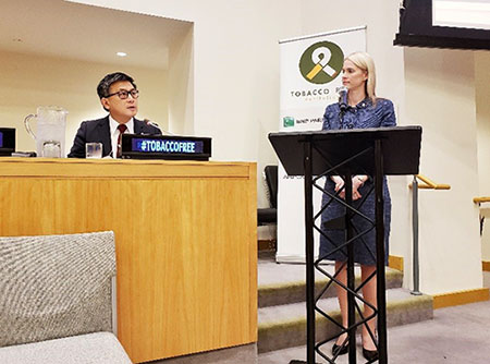 State Treasurer John Chiang speaking before an international delegation in New York City'