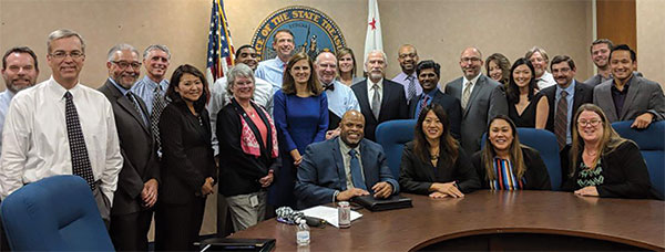 Treasurer Ma with her chief of staff, deputy treasurers, outreach team, and the executive directors of the 16 boards, commissions and authorities for which she is responsible.