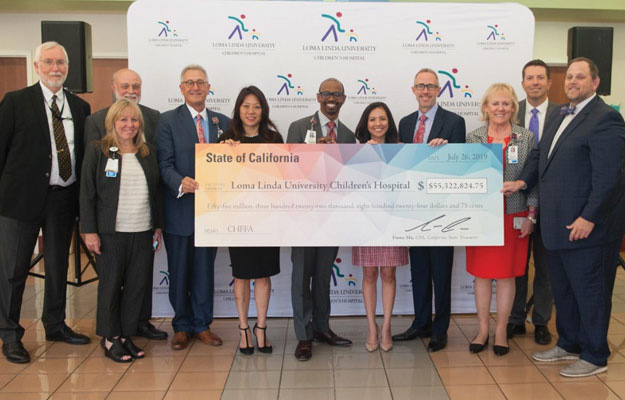 July 26. At Loma Linda University Medical Center and Children’s Hospital to present the hospital with a check for $55 million, a disbursement that will defray the cost of building a new tower for the children’s hospital. In addition to the new tower, proceeds from the Children’s Hospital Program will help pay for equipment and seismic separation between the new and old towers. The Treasurer met with Kerry Heinrich, Chief Executive Officer; Dr. Richard Chinnock, Chair of the Pediatrics Department; Scott Perryman, Senior Vice President; and Steve PonTell and Jeff Burum with National Community Renaissance. July 26. At Loma Linda University Medical Center and Children’s Hospital to present the hospital with a check for $55 million, a disbursement that will defray the cost of building a new tower for the children’s hospital. In addition to the new tower, proceeds from the Children’s Hospital Program will help pay for equipment and seismic separation between the new and old towers. The Treasurer met with Kerry Heinrich, Chief Executive Officer; Dr. Richard Chinnock, Chair of the Pediatrics Department; Scott Perryman, Senior Vice President; and Steve PonTell and Jeff Burum with National Community Renaissance.