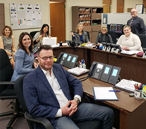 Treasurer Ma, top center, at the trading desk in the Investment Division. To her left is Investments Division Director Kristin Szakaly-Moore. Investment Division Assistant Director Jeff Wurm is standing, far right. Treasurer Ma, top center, at the trading desk in the Investment Division. To her left is Investments Division Director Kristin Szakaly-Moore. Investment Division Assistant Director Jeff Wurm is standing, far right.